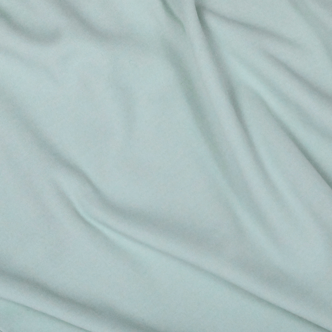 High-resolution macro shot of Maverick Tee fabric – moisture-wicking, thermoregulating, and biodegradable double-knit texture for all-day comfort