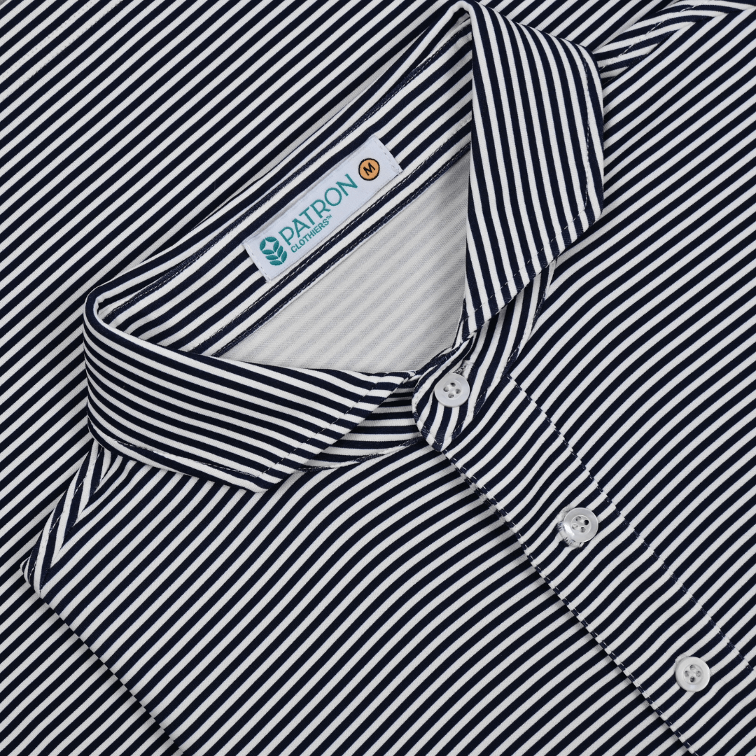 Close-up of black and white striped Maverick Polo golf shirt with tapered collar and three-button placket made from sustainable, biodegradable, moisture-wicking fabric with UPF 50 sun protection.