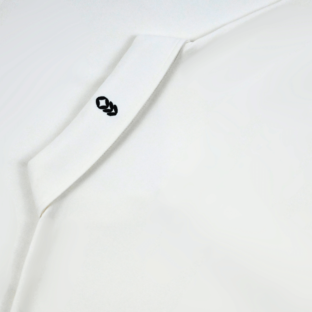 Back of the Maverick Polo and logo view – sustainable golf shirt made with biodegradable, plant-based materials