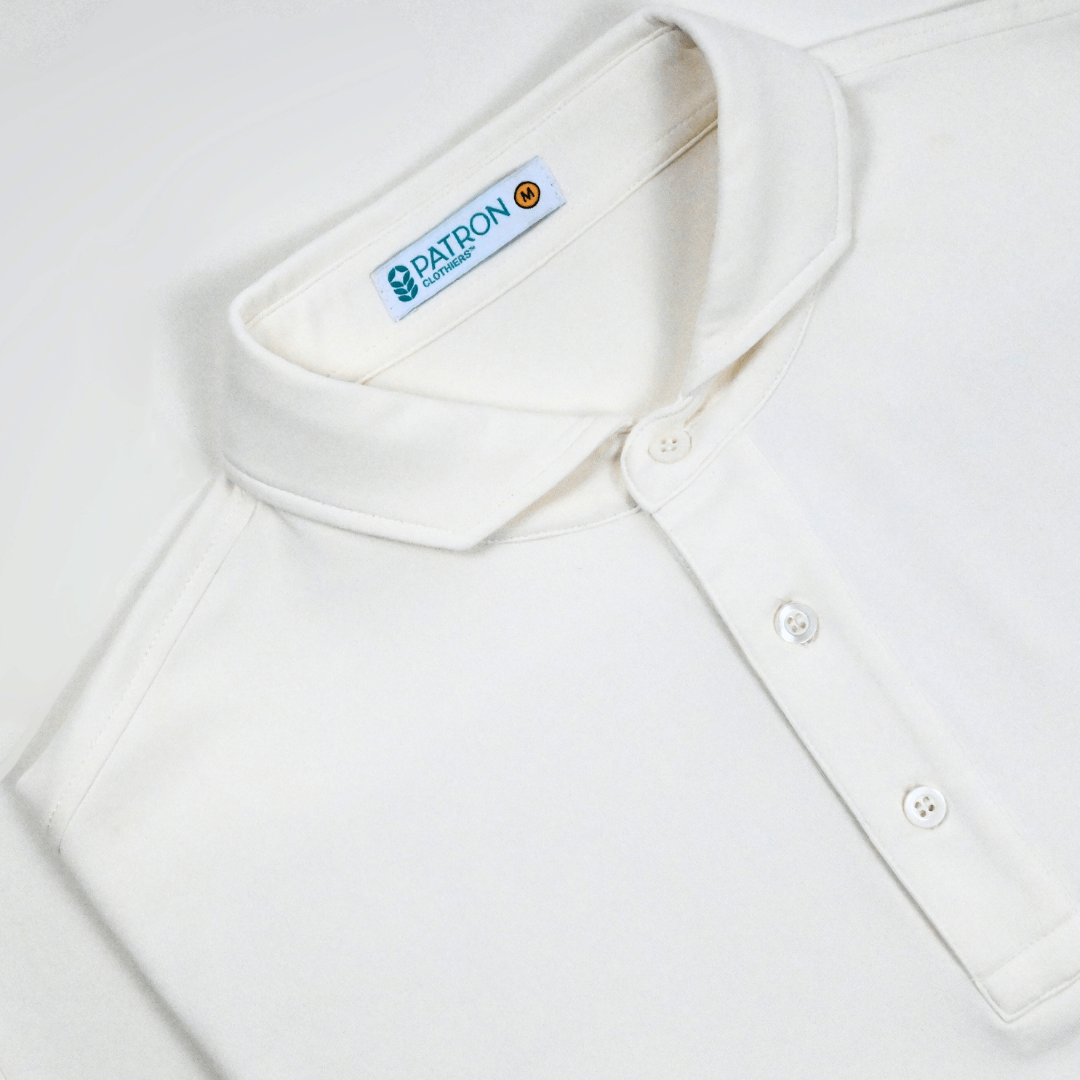Detailed close-up of the Maverick Polo’s modern tapered cutaway collar and reinforced three-button placket, crafted with low-impact dyes and breathable knit structure