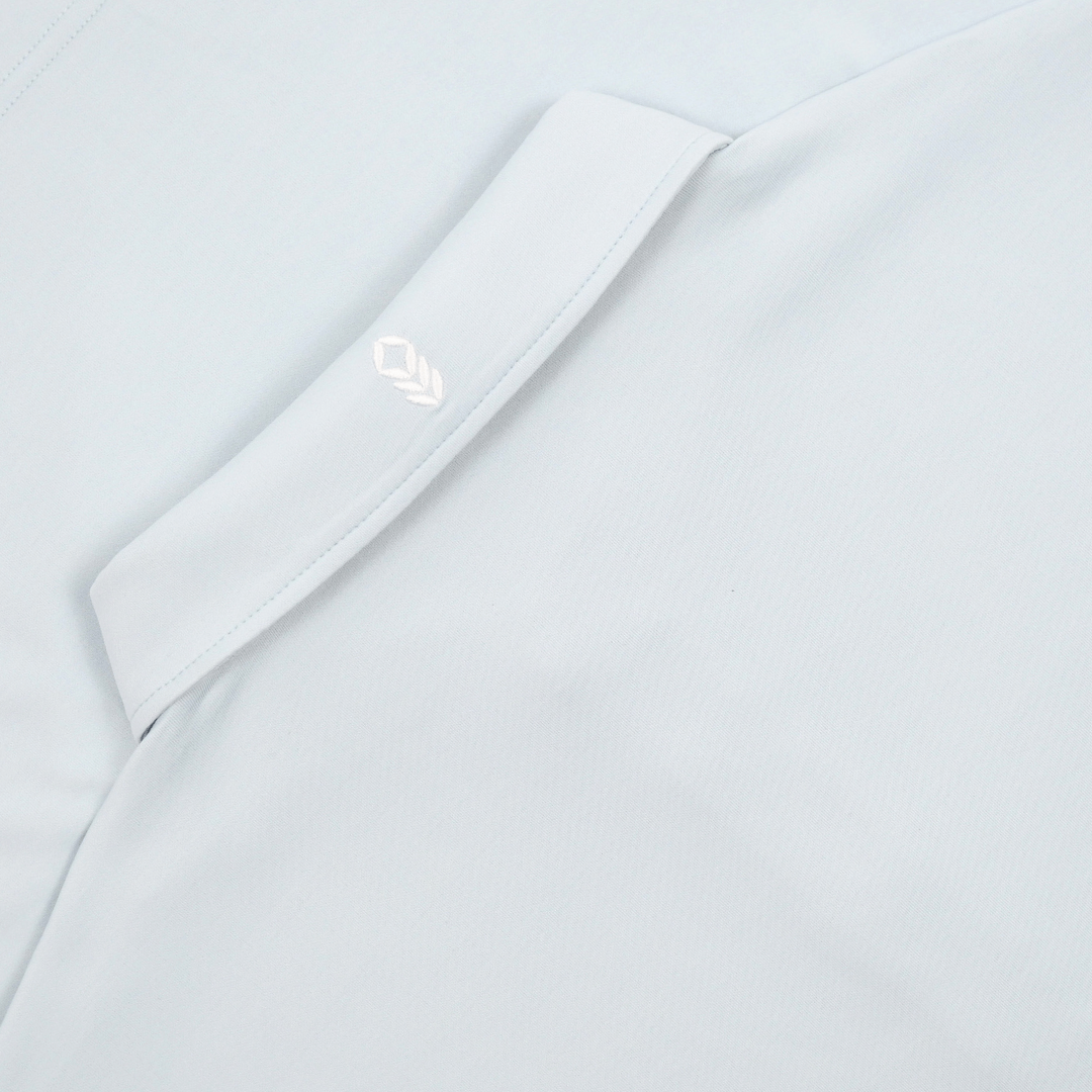 Patron Clothiers’ The Maverick Polo in Blue – Durable, sustainable men’s polo shirt crafted with breathable fabric, ideal for outdoor activities and versatile daily wear.